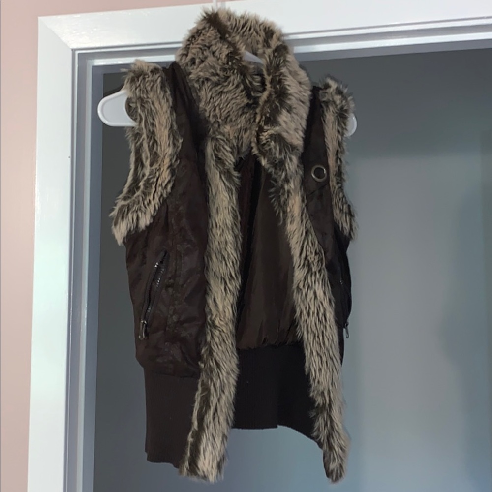 Charming Charlie furry, suede vest. (Size medium)